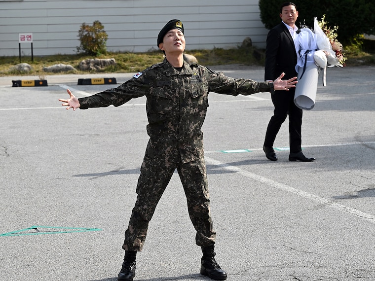 BTS member J-hope reacts after being discharged from his mandatory military service outside a military base in Wonju on October 17, 2024.