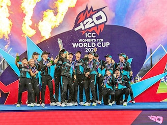 New Zealand"s players celebrate with their winning trophy at the end of the ICC Women"s T20 World Cup cricket final match between South Africa and New Zealand at the Dubai International Cricket Stadium in Dubai on October 20, 2024.