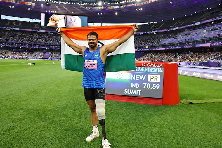 India"s Sumit Antil celebrates after defending the gold medal and setting a new Paralympics record in the Men"s Javelin Throw - F64 Final on day five of the Paris 2024 Summer Paralympic Games at Stade de France on September 02, 2024 in Paris, France.