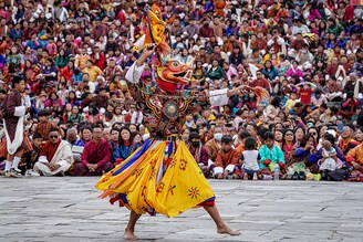 A dancer performs Cham dance during the "Thimphu Tshechu" festival at Tashichho Dzong Buddhist monastery, in Thimphu on September 14, 2024. Image: Upasana Dahal/AFP