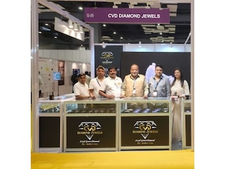 A couple walks next to a sign announcing the COP16 summit in Cali, Valle del Cauca province, Colombia, on July 22, 2024.
Image: Joaquin Sarmiento / AFP©