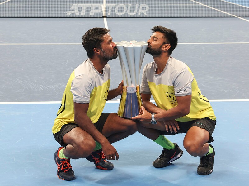 Jeevan Nedunchezhiyan and Vijay Sundar Prashanth of India pose with the trophy after winning Men"s doubles final match against Constantin Frantzen and Hendrik Jebens of Germany at the ATP 250 Hangzhou Open 2024 at Hangzhou Olympic Sports Centre Tennis Centre, China on September 24, 2024. For Nedunchezhiyan, the victory ends a seven-year title drought, while this win represents a career milestone for Prashanth as it is his first-ever ATP title.