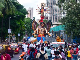 Devotees carry Goddess Durga idol to the pandal ahead of the Navratri festival on September 29, 2024, in Mumbai, India.