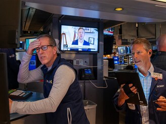 Traders work on the floor of the New York Stock Exchange (NYSE) on April 04, 2025 in New York City. Stocks fell sharply again Friday as the world continues to react to US President Donald Trump"s sweeping new tariffs on major US trade partners.