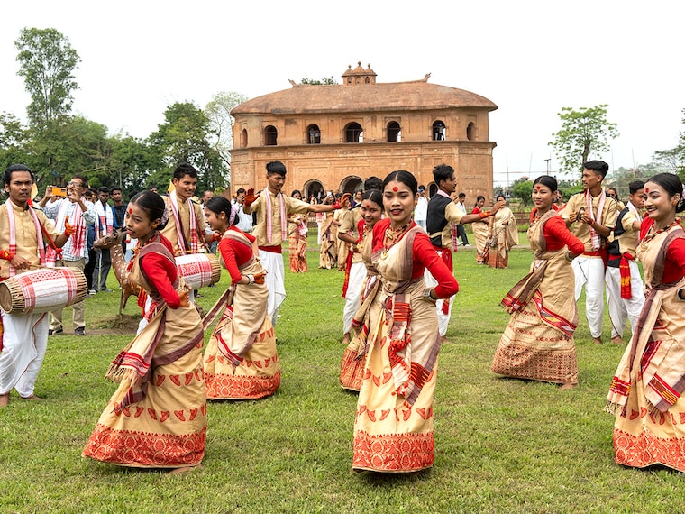 Dancers perform the Bihu dance at the historic Rang Ghar premises during Rongali Bihu celebrations in Sivasagar, India, on April 15, 2025.