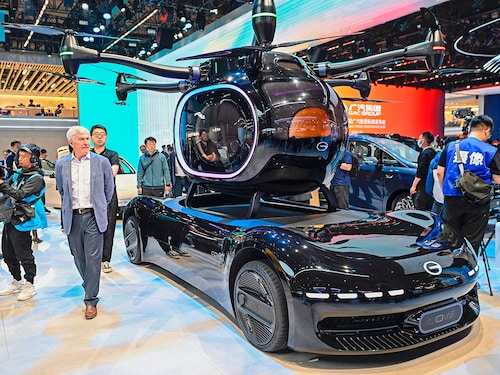 A GAC Group’s Trumpchi COVE flying car is displayed during the 21st Shanghai International Automobile Industry Exhibition at the NECC in Shanghai, China on April 23, 2025. The world’s largest auto expo opened its doors Wednesday in Shanghai, showcasing technological innovation and the new electric world order even as mounting trade barriers risk dampening China’s global ambitions.