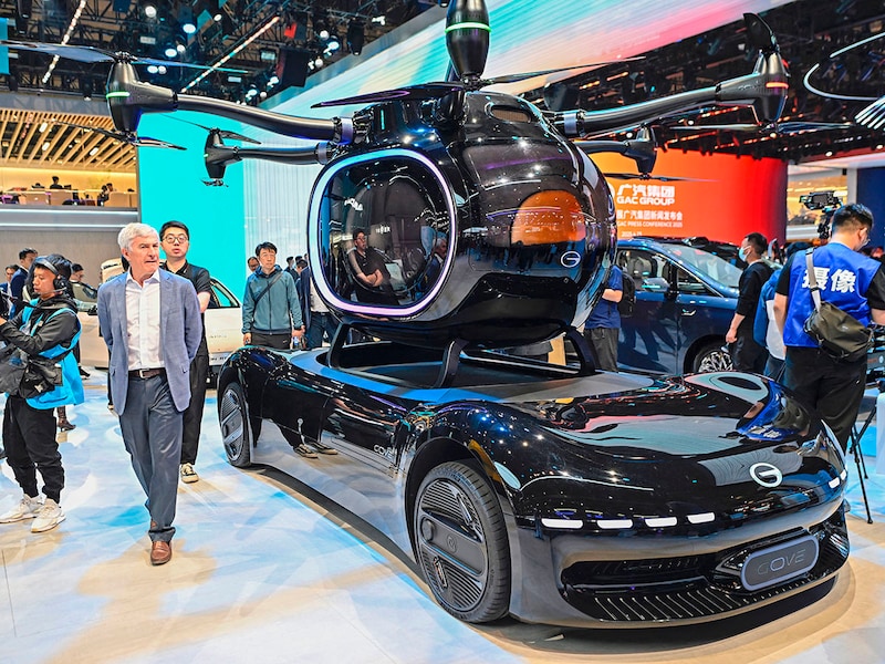 A GAC Group’s Trumpchi COVE flying car is displayed during the 21st Shanghai International Automobile Industry Exhibition at the NECC in Shanghai, China on April 23, 2025. The world’s largest auto expo opened its doors Wednesday in Shanghai, showcasing technological innovation and the new electric world order even as mounting trade barriers risk dampening China’s global ambitions.