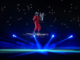 A person operates a SkySurfer aircraft as he carries the trophy to the stadium grounds for the the Copa del Rey (King"s Cup) final football match between FC Barcelona and Real Madrid CF at La Cartuja stadium in Seville on April 26, 2025. Barcelona won their 32nd Copa del Rey title after Jules Kounde"s goal in extra time secured the 3-2 victory over Real Madrid.