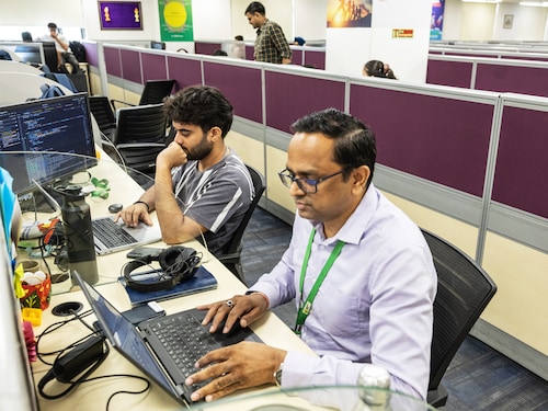 Tech leads at work at  the Happiest Minds Technologies offices in Noida, Delhi NCR. Data shows that the IT sector is more likely to hire experienced personnel in 2025.
Image : Madhu Kapparath