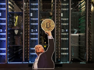 A cutout of US President Donald Trump holding a Bitcoin is displayed on a group of servers during The Bitcoin Conference at The Venetian Las Vegas in Las Vegas, Nevada.
Image: Ian Maule / AFP