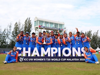 Trisha G and Niki Prasad of India hold the trophy alongside teammates after winning the ICC Women"s U19 T20 World Cup 2025 Final between South Africa and India at Bayuemas Oval on February 02, 2025, in Kuala Lumpur, Malaysia.
