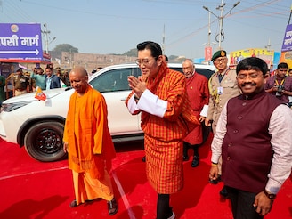 Bhutan"s King Jigme Khesar Namgyel Wangchuck and Chief Minister of Uttar Pradesh Yogi Adityanath arrive to take a holy dip at the "Maha Kumbh Mela", or the Great Pitcher Festival, in Prayagraj, India, February 4, 2025.