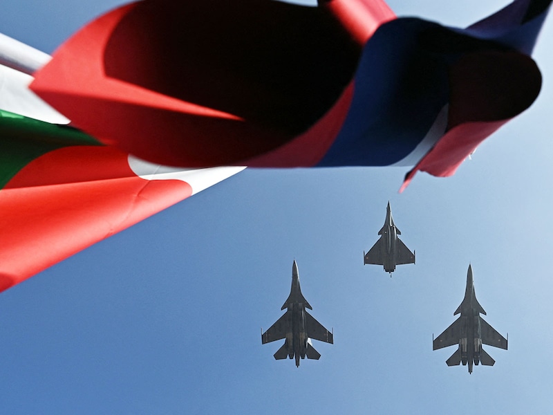 The Indian Air Force HAL Tejas and Sukhoi Su-30 fighter jets perform during the inaugural day of the 15th edition of "Aero India 2025", a military aviation exhibition at the Yelahanka Air Force Station in Bengaluru on February 10, 2025.