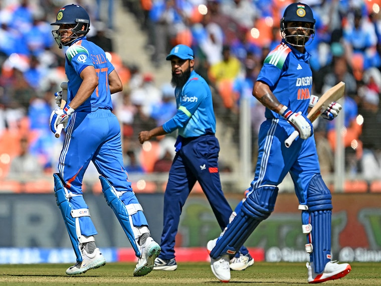 Virat Kohli (R) and Shubman Gill (L) run between the wickets during the third one-day international (ODI) cricket match between India and England at the Narendra Modi Stadium in Ahmedabad on February 12, 2025. Both players made half centuries.