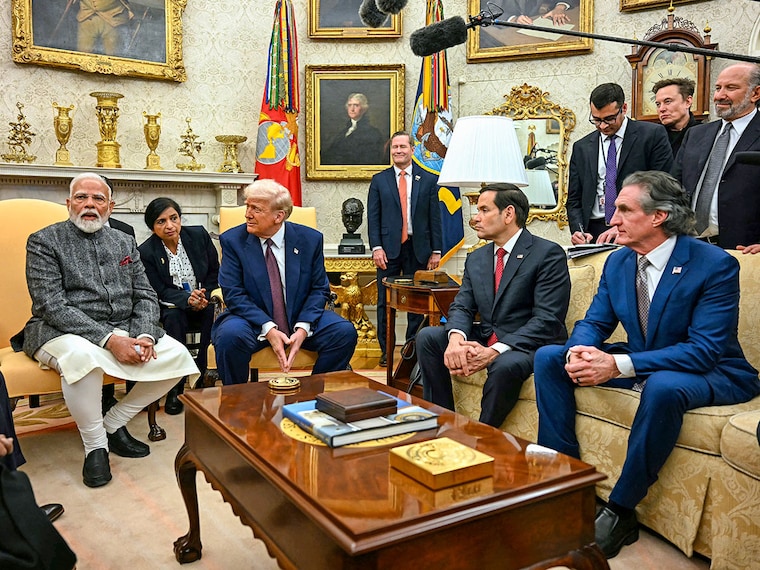 US President Donald Trump meets with Indian Prime Minister Narendra Modi, alongside US Secretary of State Marco Rubio (2nd R), US Secretary of the Interior Doug Burgum (R), in the Oval Office of the White House in Washington, DC, on February 13, 2025.