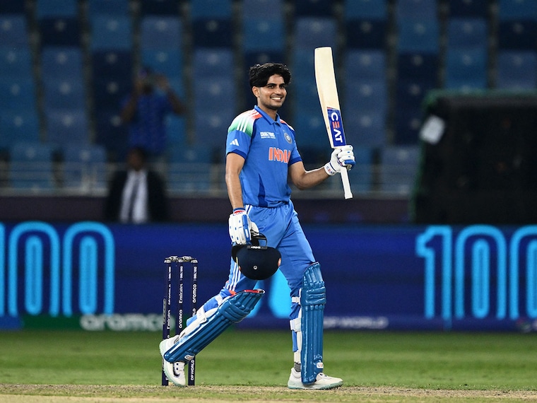 India"s Shubman Gill celebrates after scoring a century during the ICC Champions Trophy one-day international cricket match between Bangladesh and India at the Dubai International Stadium in Dubai on February 20, 2025.