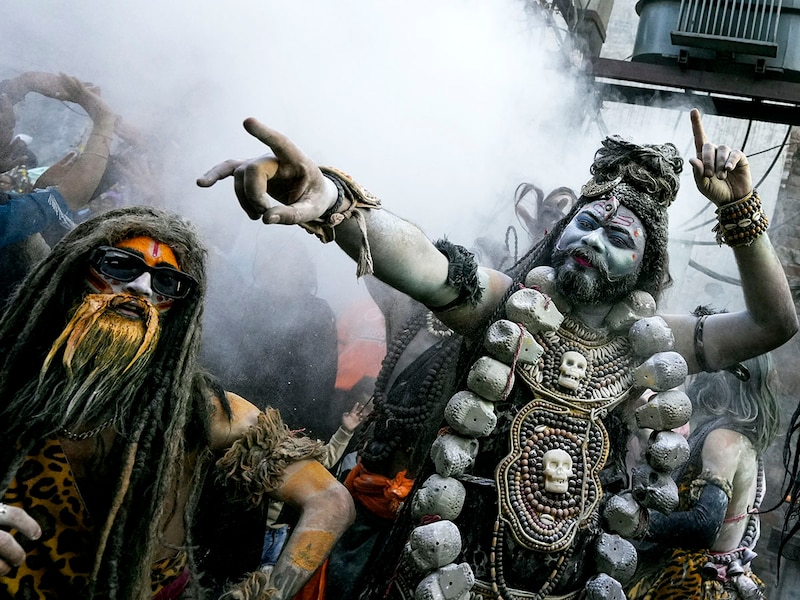 Devotees take part in a religious procession on the eve of Maha Shivratri festival in Amritsar on Tuesday, February 25, 2025.