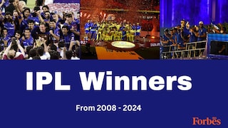 The Rajasthan Royals team celebrate with the IPL trophy after their win over Chennai in the final of IPL 1 at D.Y. Patil stadium on June 1, 2008 in Mumbai, India. Photo by Santosh Harhare / Hindustan Times via Getty Images