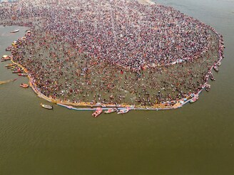 An aerial view of pilgrims taking a holy dip in Sangam, on the occasion of Maha Shivaratri during the Maha Kumbh Mela festival in Prayagraj. India"s Kumbh Mela festival wraps up on February 26, with final ritual river bathing ceremonies ending six weeks of celebration that organisers say have been attended by hundreds of millions of devotees.