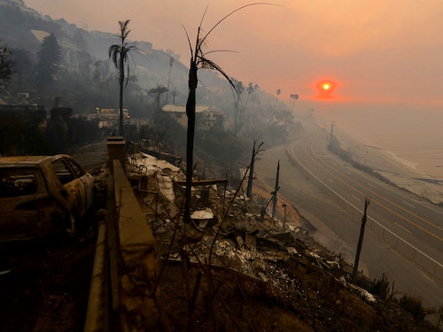 The sun rises over the Pacific Palisades neighbourhood of west Los Angeles on January 9, 2025, in the aftermath of devastating wildfires that forced people to evacuate the area.