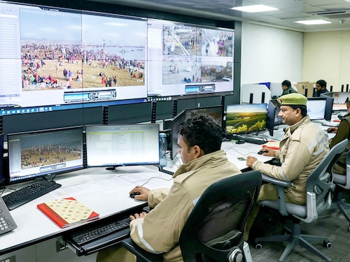 Police monitor the situation via screens at the Integrated Command and Control Center, set up to manage and control the crowd, during the Maha Kumbh Mela festival in Prayagraj on January 17, 2025. Keen to improve India"s abysmal crowd management record at large-scale religious events, organisers of the world"s largest human gathering are using artificial intelligence (AI) to try to prevent stampedes.
Image: Niharika Kulkarni / AFP