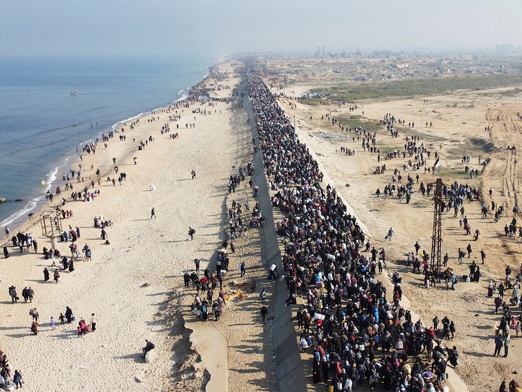 A drone view shows Palestinians, who were displaced to the south at Israel"s order during the war, making their way back to their homes in northern Gaza, amid a ceasefire between Israel and Hamas, in the central Gaza Strip, January 27, 2025.