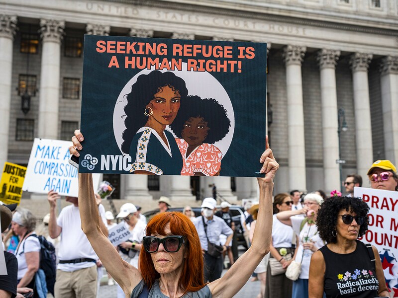 People take part in "Good Trouble Lives On" rally and march to commemorate the fifth anniversary of the death of former US congressman and civil rights leader John Lewis and to denounce the Trump administration"s immigrations polices in New York, US , on July, 17, 2025.