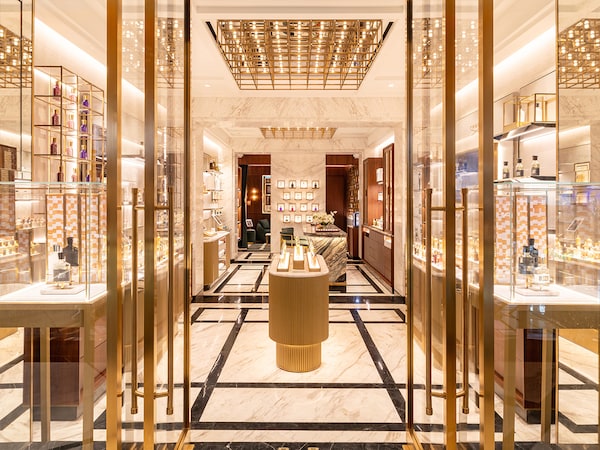 Verde Luana marble, brushed brass, American walnut panelling, and rich textured fabrics come together to create the interior of the boutique at Chanakya
