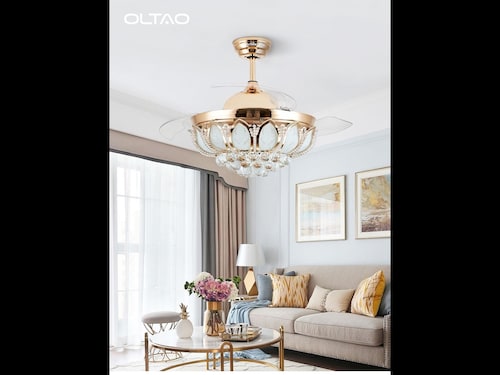 Oltao’s designer chandelier fan with retractable blades adds elegance and energy efficiency to a modern living room — blending smart lighting with sustainable design. Oltao’s designer chandelier fan with retractable blades adds elegance and energy efficiency to a modern living room — blending smart lighting with sustainable design.