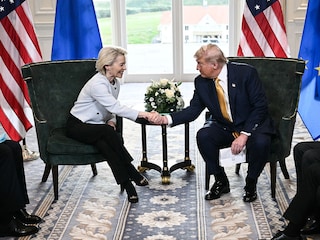 US President Donald Trump shakes hands with European Commission President Ursula von der Leyen after agreeing on a trade deal between the two economies following their meeting, in Turnberry, south west Scotland on July 27, 2025
Photo by Brendan Smialowski/ AFP