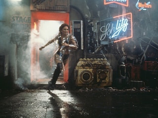 American actress Joanna Cassidy, as the replicant Zhora, flees the nightclub, where she works, after being identified by "blade runner" Rick Deckard in a scene from Ridley Scott"s futuristic thriller "Blade Runner", 1982.
Image: Warner Bros./Archive Photos/Getty Images