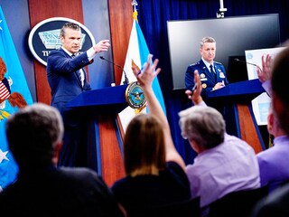 Arlington, Virgina - June 22: U.S. Defense Secretary Pete Hegseth (L), accompanied by Chairman of the Joint Chiefs of Staff Air Force Gen. Dan Caine (R), takes a question from a reporter during a news conference at the Pentagon on June 22, 2025 in Arlington, Virginia. U.S. President Donald Trump gave an address to the nation last night after three Iranian nuclear facilities were struck by the U.S. military. Photo by Andrew Harnik / Getty Images North America / Getty Images via AFP