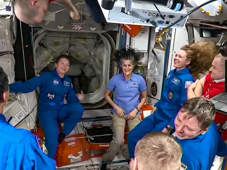 In this screenshot from a NASA video shows Sunita Williams and other astronauts greeting each other after the SpaceX capsule docked with the International Space Station, Sunday, March 16th, 2025.
