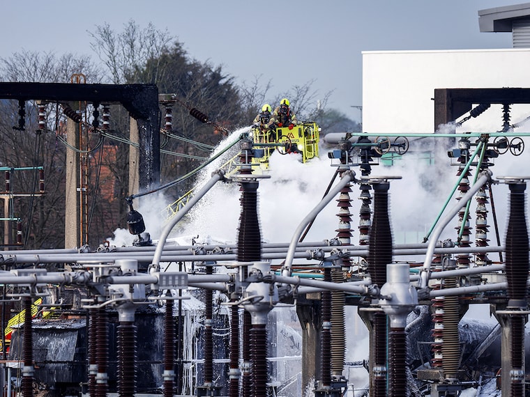 Firefighters douse flames after a fire broke out at a substation supplying power to Heathrow Airport in Hayes, west London, on March 21, 2025. Officials said that Britain"s Heathrow airport, Europe"s busiest, was shut down early on March 21 for 24 hours after a major fire at an electricity substation cut power to the sprawling facility west of London.