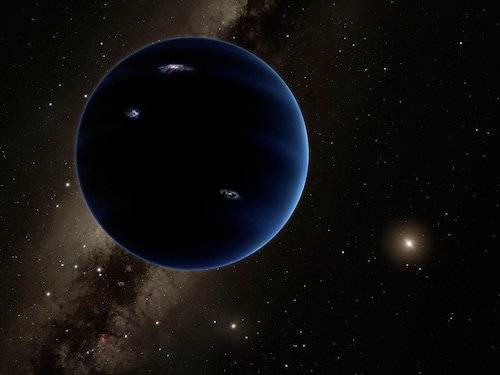 Some astronomers say the strange, clustered orbits of icy rocks beyond Neptune indicate that something big is out there, which they have dubbed Planet Nine.
Image: AFP Photo/ Caltech/ Robert Hurt