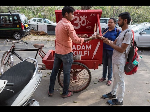 <strong>Kulfi</strong><br />&ldquo<em>Photo kya le rahe ho</em> <em>(Why are you just clicking pictures?)</em> &ndash come taste the kulfi, I make it with my own hands,&rdquo says Munendra Gupta. He often gets catering orders from customers during wedding season. At Rs 10 a stick, he sells 150 to 200 sticks a day. <br /><br /> <strong>Kulfi</strong><br />&ldquo<em>Photo kya le rahe ho</em> <em>(Why are you just clicking pictures?)</em> &ndash come taste the kulfi, I make it with my own hands,&rdquo says Munendra Gupta. He often gets catering orders from customers during wedding season. At Rs 10 a stick, he sells 150 to 200 sticks a day. <br /><br />