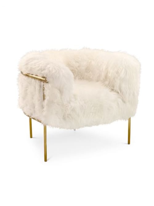  <strong>CORONUM ARMCHAIR (SNOW WHITE COLLECTION) </strong><br />Scarlet Splendour will be launching exciting new collections at this year&#39s Salone Del Mobile - Milan Design Week by renowned international designers - Italian maverick Matteo Cibic, Slovenian minimalistic Nika Zupanc and UK based flamboyant Artefatto Design Studio. <br /><br />London based Artefatto Design Studio, have indulgently worked on the alluring Snow White collection, crossing the boundaries between art, design and luxury fashion, in order to create a unique and personal vision for the collection. <br /><br />Scarlet Splendour&#39s curated collection of alluring chairs, rugs and artefacts crafted with the finest sheepskin found in all the realms, are held by golden frames. This is what it must feel like to waft away to your own kingdom of clouds and gentle surrealism, within a world, which may no longer be dreamlike. It&rsquos a promise of luxury, beyond imagination. The soul of this collection rests in the majestic crowns of kings and queens, past and present.
