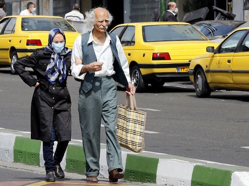  <p>TEHRAN, IRAN: A 103-year-old woman in Iran has recovered after being infected with the new coronavirus, state media reported, despite overwhelming evidence the elderly are most at risk from the disease. An elderly man and a woman, wearing a protective mask, walk along a street in Iran"s capital Tehran on March 15, 2020</p>
<p>&nbsp</p>