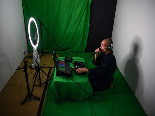  <p><strong>BEATBOX MONK, JAPAN</strong></p>
<p>Yogetsu Akasaka, a Japanese musician and Buddhist monk, presenting a livestream beatboxing performance at his home in Tokyo. Akasaka has become a viral phenomenon with musical tracks marrying religious chanting with beatboxing, with his Heart Sutra Looping Remix being viewed on YouTube many million times since it was posted last May</p>