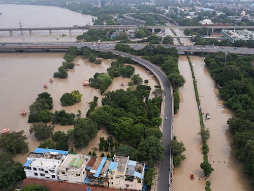  <p>A drone shot of flooded streets showing New Delhi and the swollen Yamuna River due to monsoon rains, in New Delhi, India, Thursday, July 13, 2023.</p>