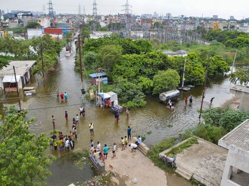  <p>Residents shift to a safer place from the flooded Karhera area after a rise in Hindon river"s water in Ghaziabad, Uttar Pradesh, July 23, 2023.</p>
