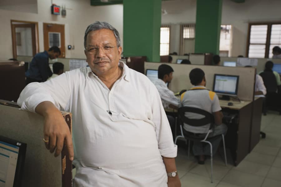 The Men Who Made Microfinance Work