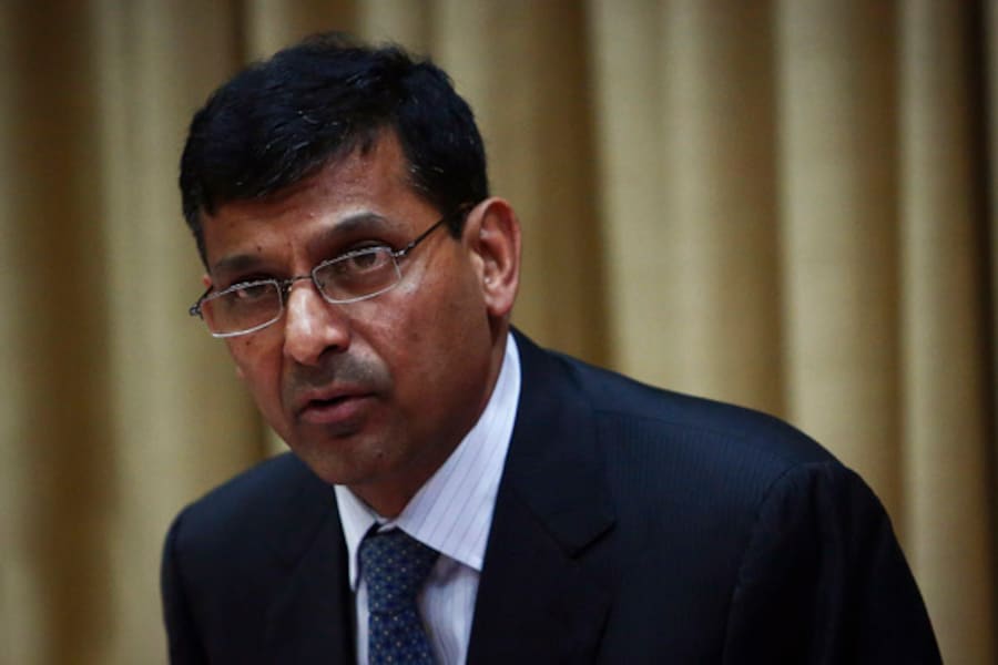 Raghuram Rajan signals 'extended pause' on rates