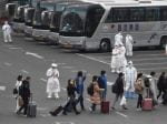 China Imposes New Limits as Coronavirus Fears Return