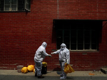 Photo of the Day: Partners in PPE