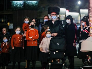 Photo of the Day: A masked vigil