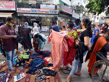 Photo of the Day: At Mangal Bazar, it's business as usual