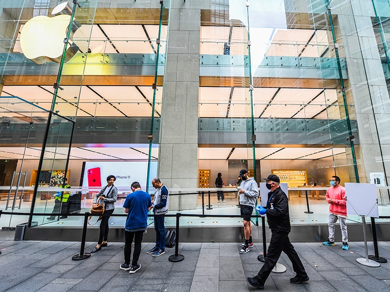 Photo of the Day: Customers queue outside the Apple store for new products, socially distanced