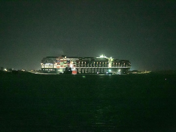 Clearing the Suez Canal took days. Figuring out the costs may take years
