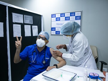 Photo of the day: First day, first jab